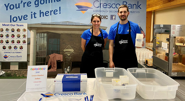 Laura Schmauss and Ryan Crain volunteering at the Cresco Fair